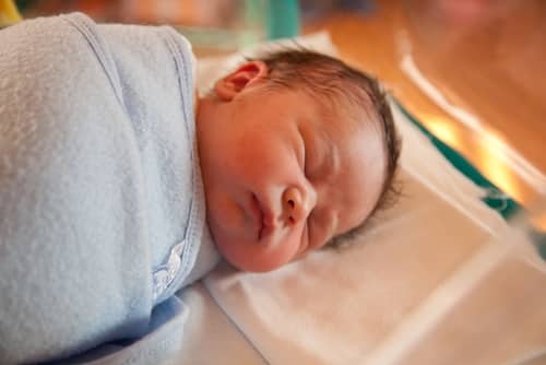 Evening Feeding: Why Day Cares Are Banning Swaddling