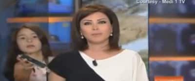 Moroccan Newscaster Interrupted By Daughter Live On Air, Handles It Like A Boss