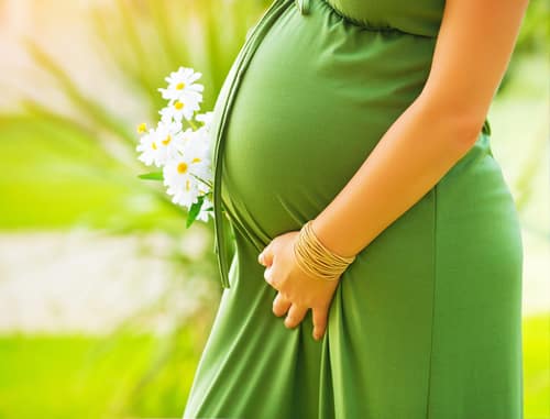 Evening Feeding: Yoga Pants, Maxi Dresses, and Other Reasons to Love Pregnancy