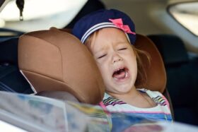 girl crying in car