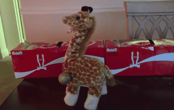 This Possessed Toy Giraffe Proves Santa And Satan Are The Same Person