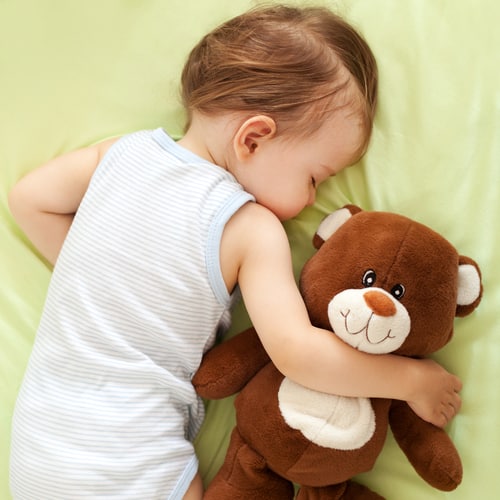 child with teddy