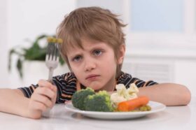 little boy does not want to eat vegetables