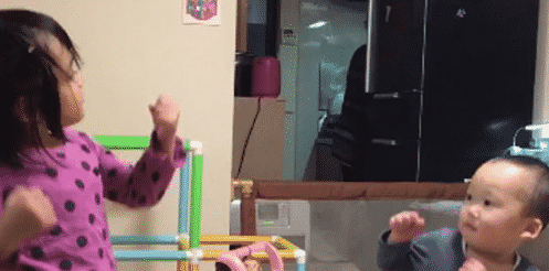 This Toddler is Teaching Her Baby Brother Karate, and Sibling Rivalry Has Never Been so Cute