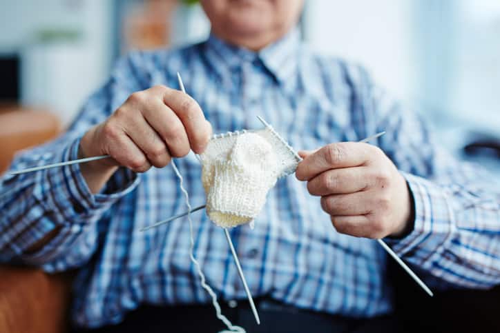 Adorable Grandpa Teaches Self to Knit Hundreds of Tiny Hats for Premature Babies