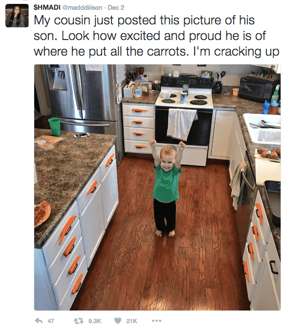 Everyone Should Feel as Triumphant as this Toddler Balancing Carrots All Over the Kitchen