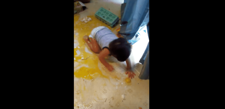 This Video of a Toddler Flopping Around in Raw Eggs Will Make You Laugh and Gag
