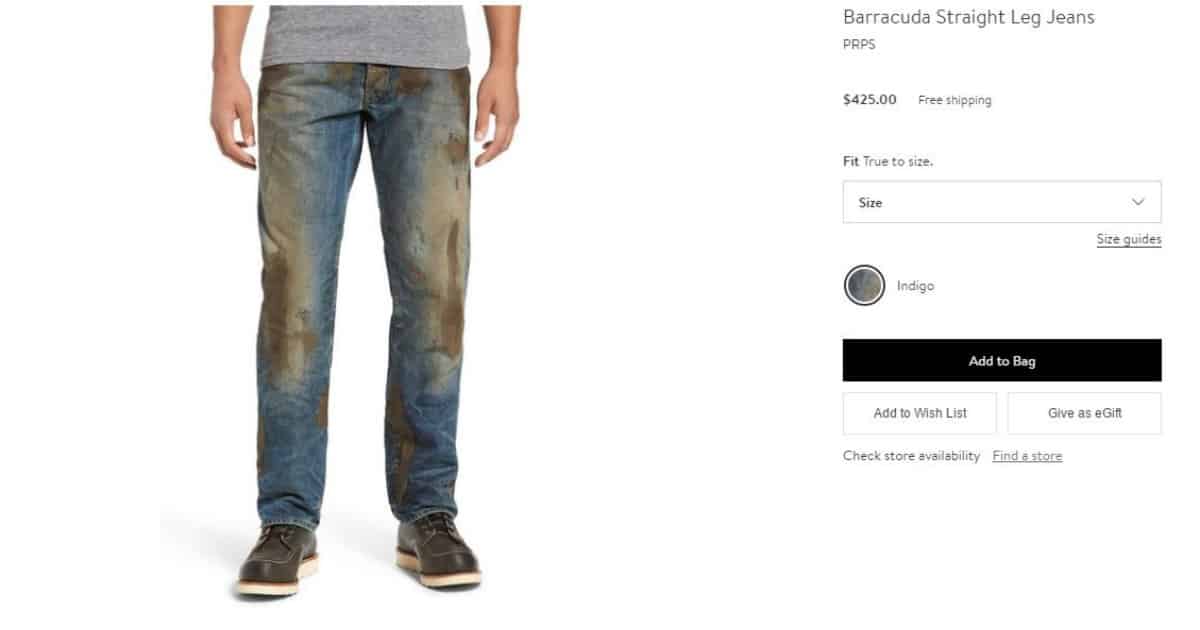 Distressed jeans with mud