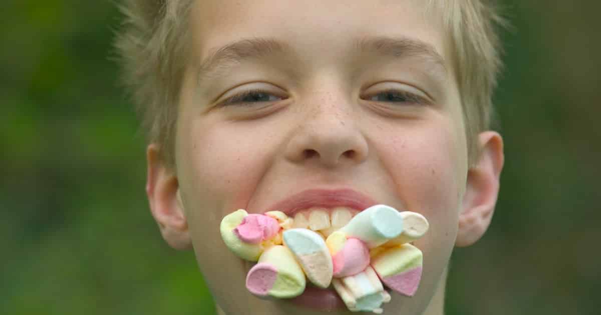 boy eating candy