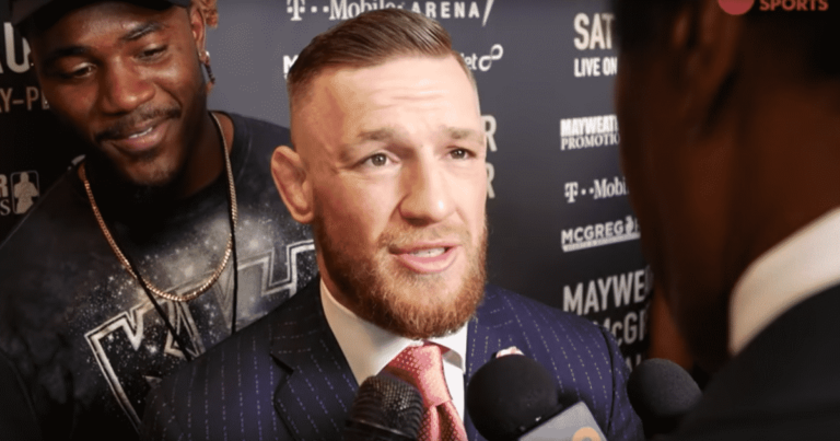 UFC Fighter Conor McGregor’s Suit Has the Perfect Message for His Haters