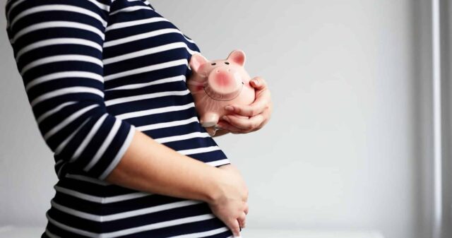 pregnant woman piggy bank