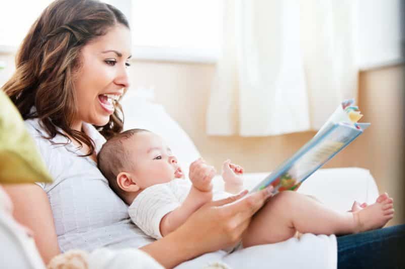 baby and mom reading