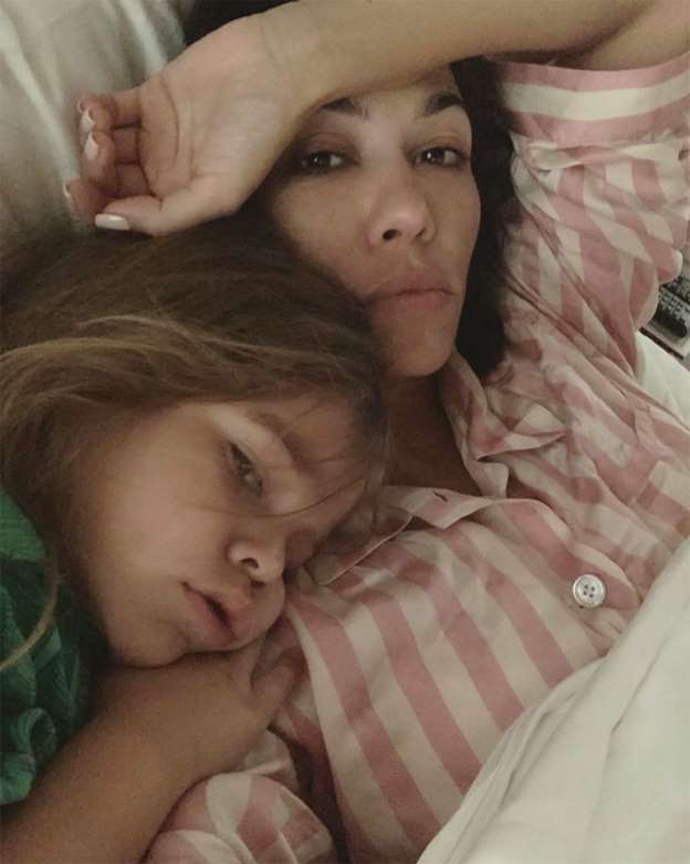 Kourtney Kardashian ikids n bed with son Reign