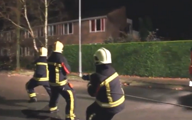 This Cute Video Of A Dog Assisting Firefighters Will Brighten Your Day